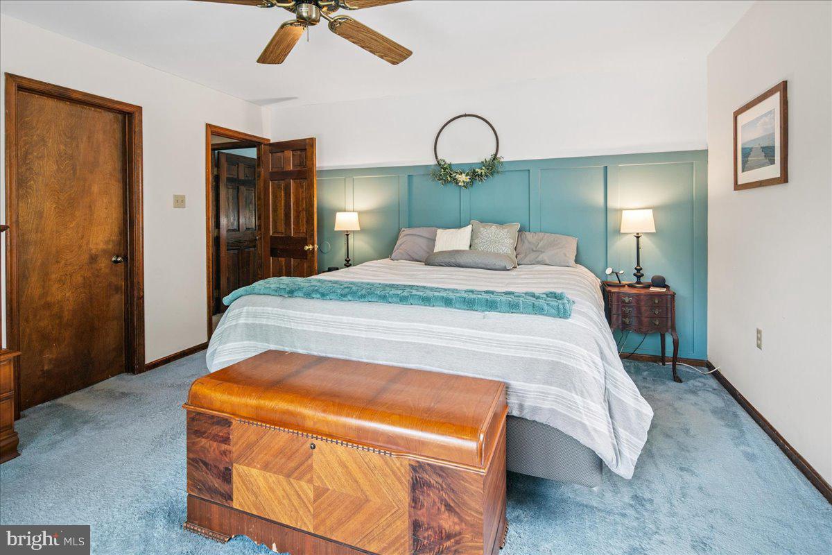 8 High Acres Drive Ewing, NJ 08628 - Photo 24 of 43 a bedroom with a bed and dresser with mirror