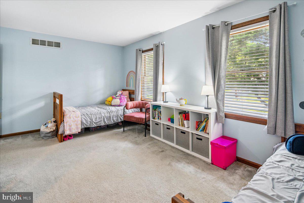 8 High Acres Drive Ewing, NJ 08628 - Photo 26 of 43 a room with a bed and a window