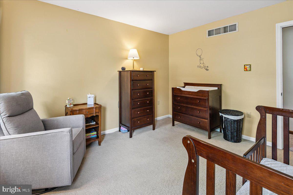 8 High Acres Drive Ewing, NJ 08628 - Photo 30 of 43 a living room with furniture a piano and wooden floor