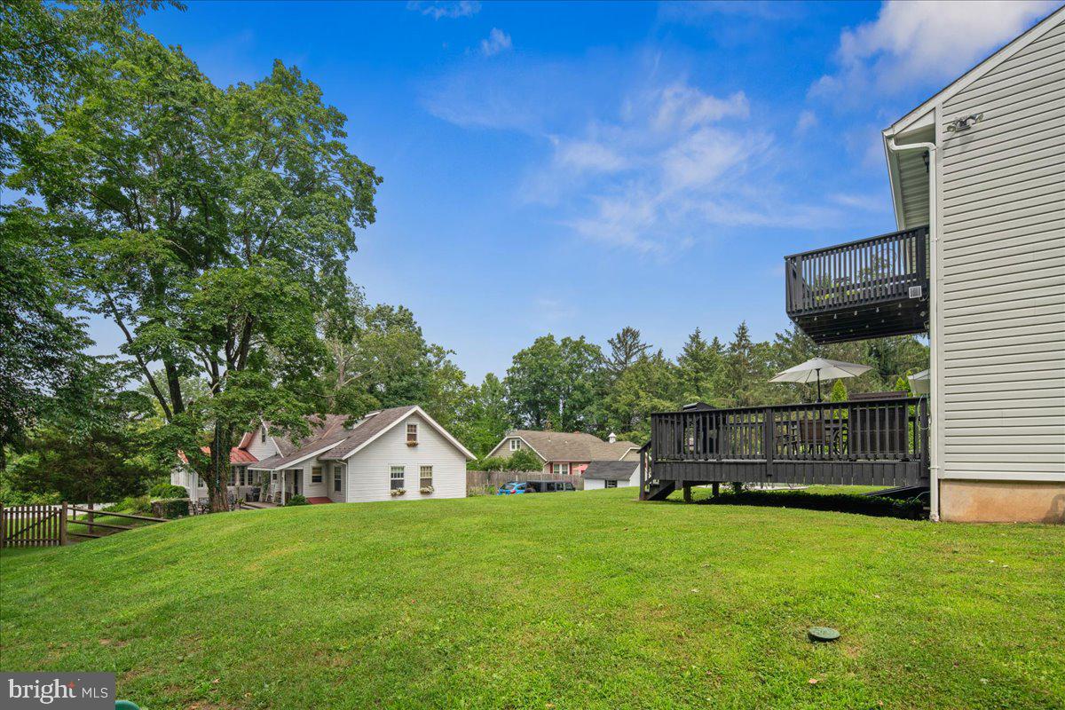 8 High Acres Drive Ewing, NJ 08628 - Photo 34 of 43 a front view of a house with a garden