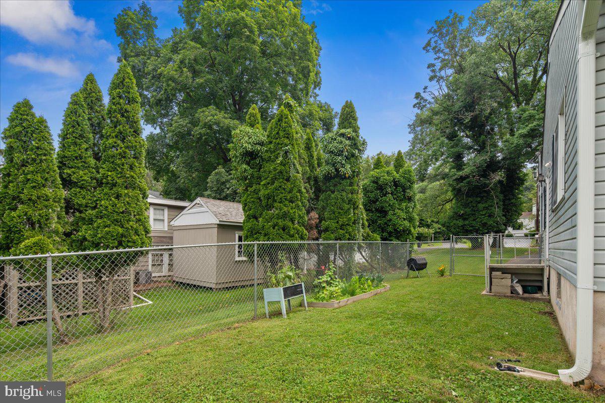 8 High Acres Drive Ewing, NJ 08628 - Photo 37 of 43 a backyard of a house with table and chairs