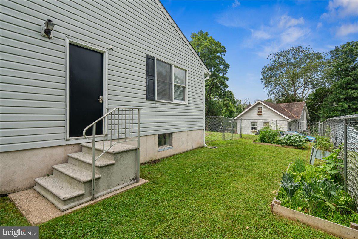 8 High Acres Drive Ewing, NJ 08628 - Photo 39 of 43 a front view of a house with a yard