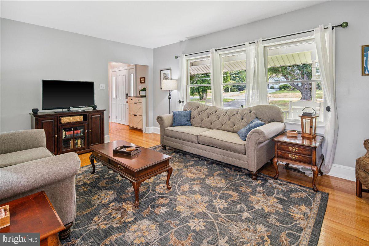 8 High Acres Drive Ewing, NJ 08628 - Photo 5 of 43 a living room with furniture a flat screen tv and a large window