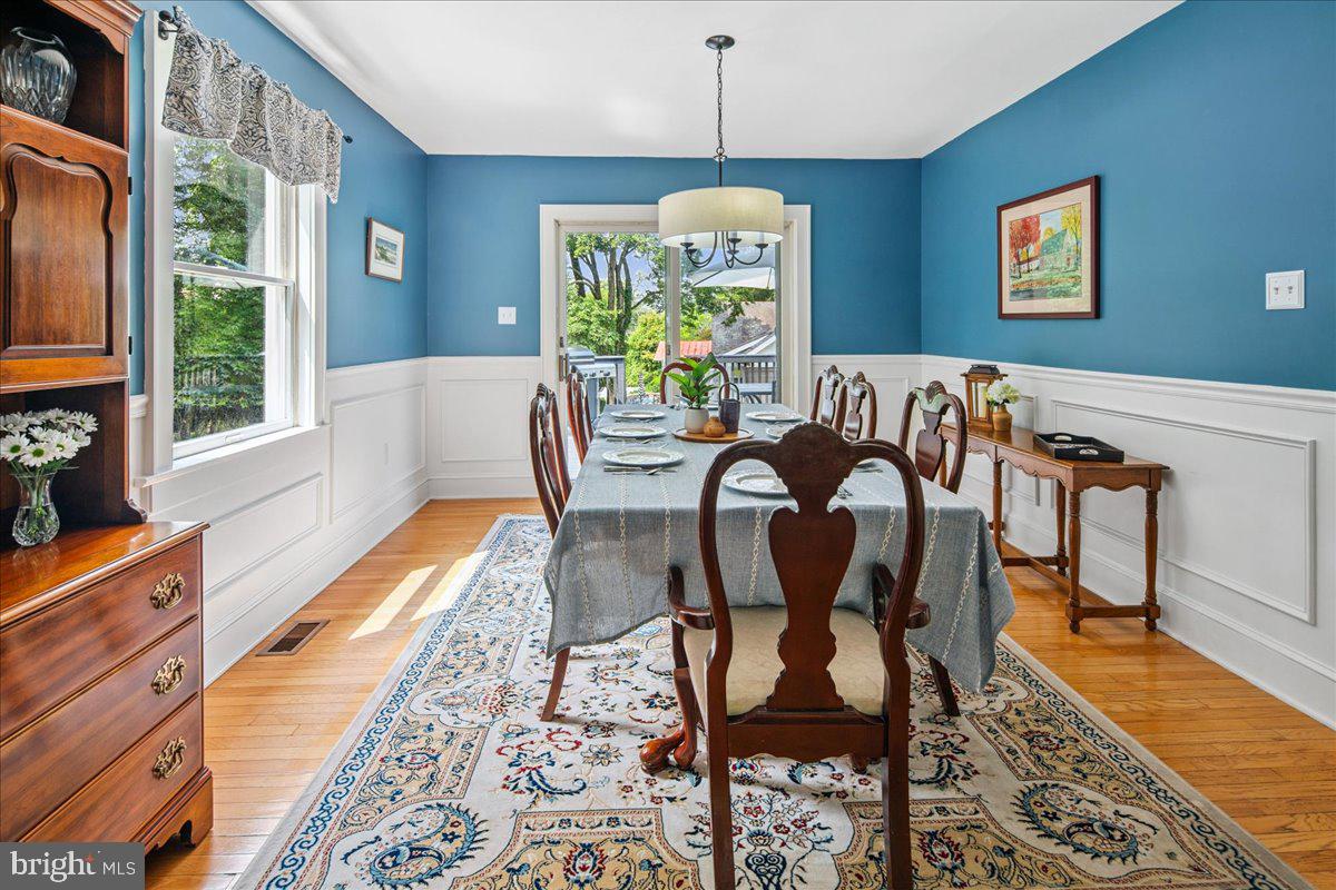 8 High Acres Drive Ewing, NJ 08628 - Photo 7 of 43 a view of a dining room with furniture window and wooden floor