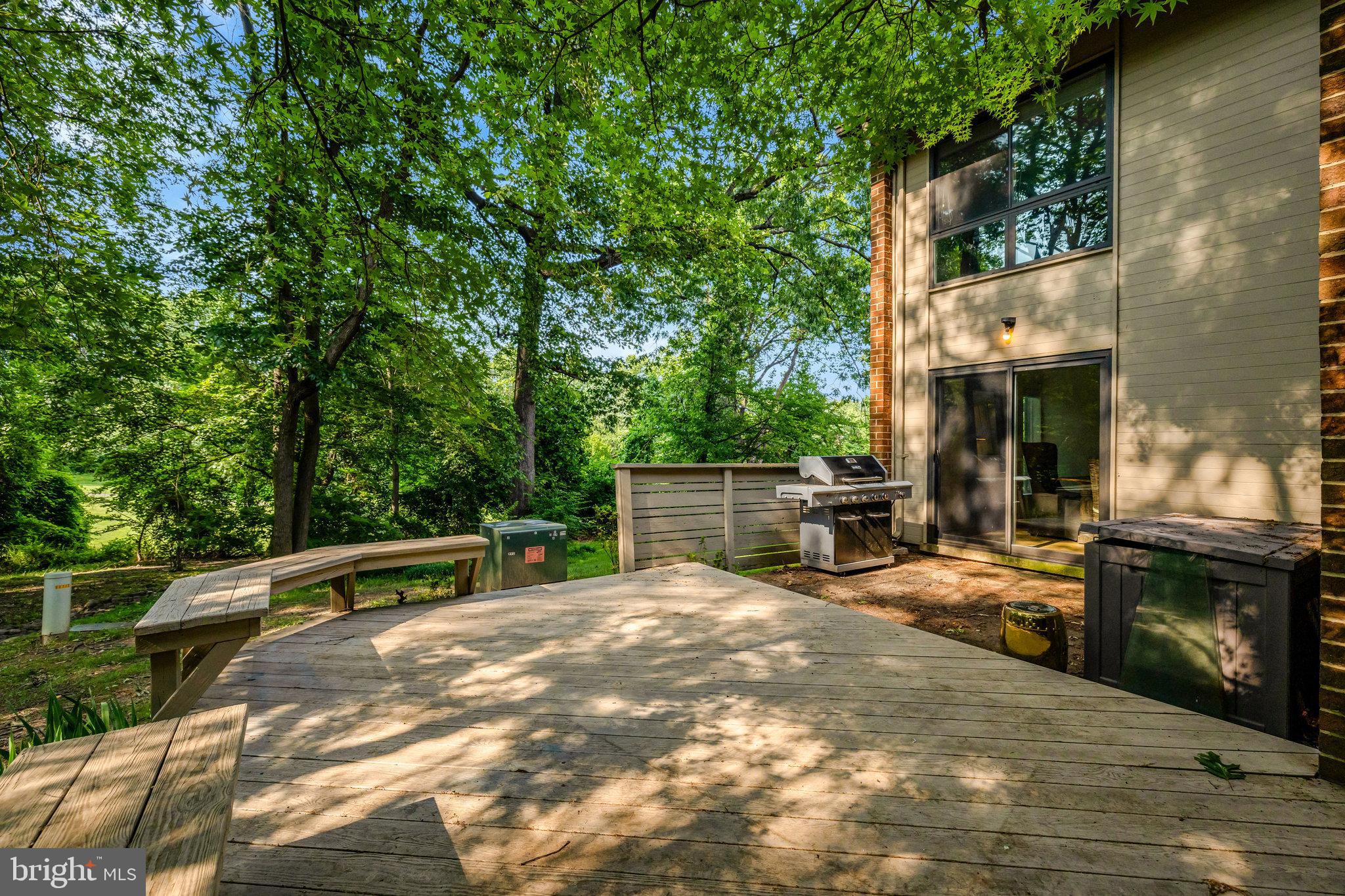 11712 Indian Ridge Road Reston, VA 20191 - Photo 42 of 77 a view of backyard with outdoor seating and plants