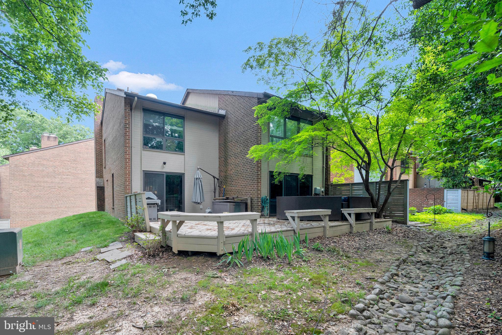 11712 Indian Ridge Road Reston, VA 20191 - Photo 49 of 77 a view of a house with backyard and sitting area