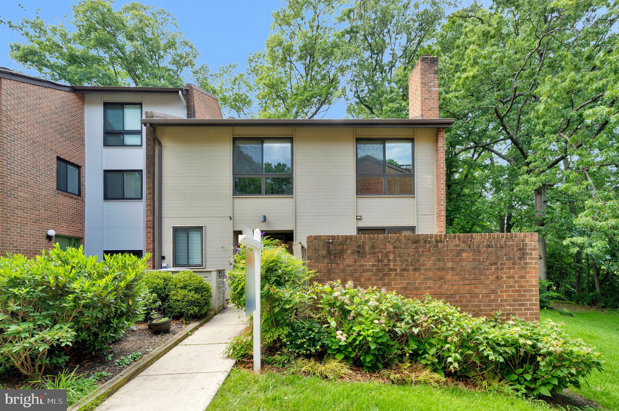 11712 Indian Ridge Road Reston, VA 20191 - Photo 6 of 77 front view of a house with a yard