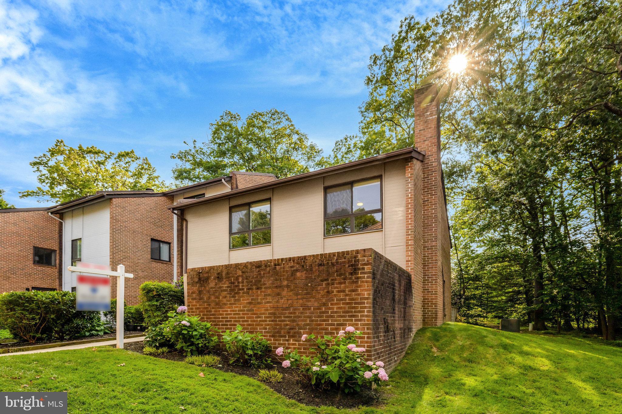 11712 Indian Ridge Road Reston, VA 20191 - Photo 8 of 77 a front view of a house with a yard