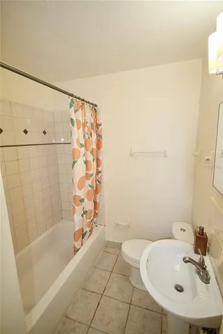 a bathroom with a sink and a shower