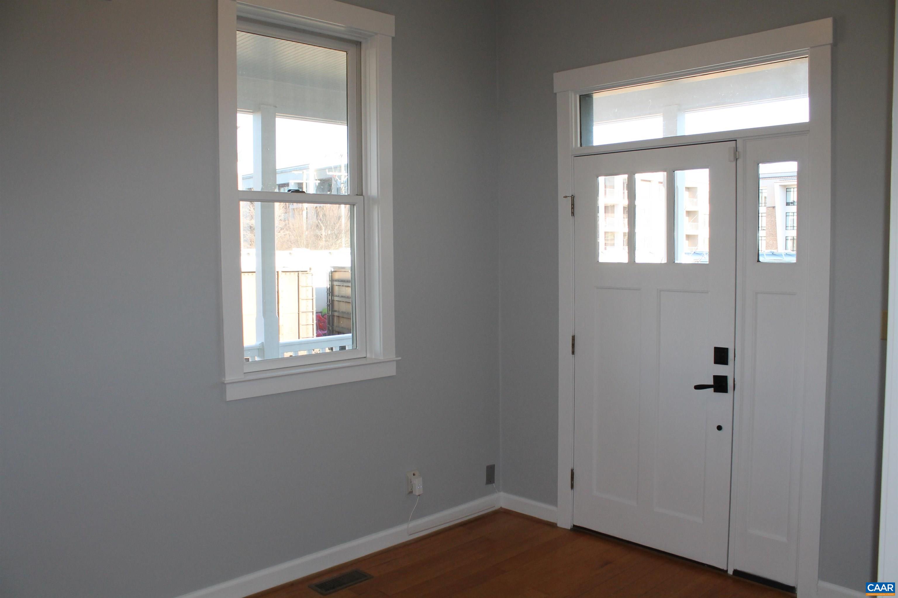 211 Spruce Street Charlottesville, VA 22902 - Photo 13 of 58 an empty room with windows