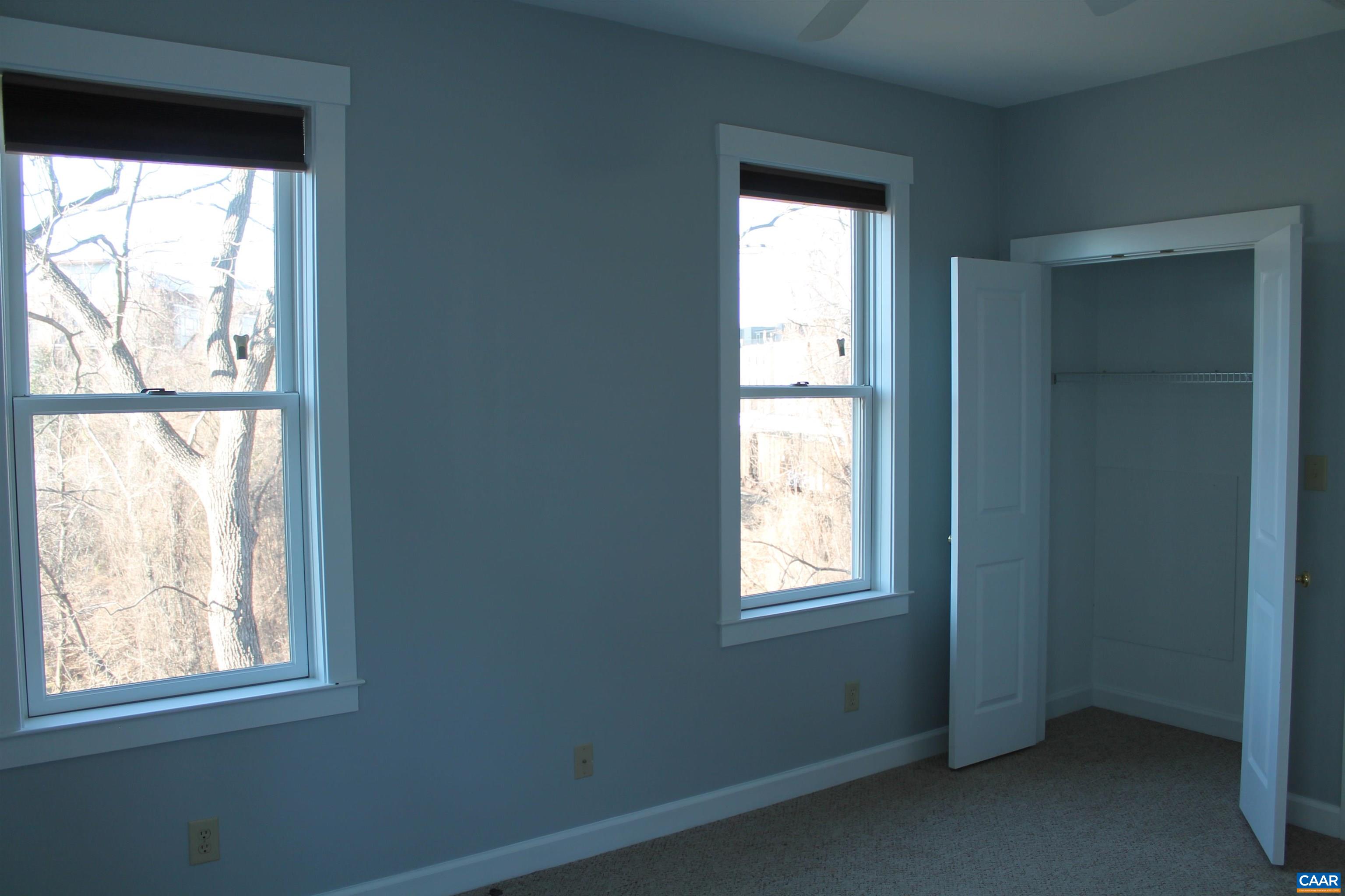 211 Spruce Street Charlottesville, VA 22902 - Photo 21 of 58 an empty room with a window