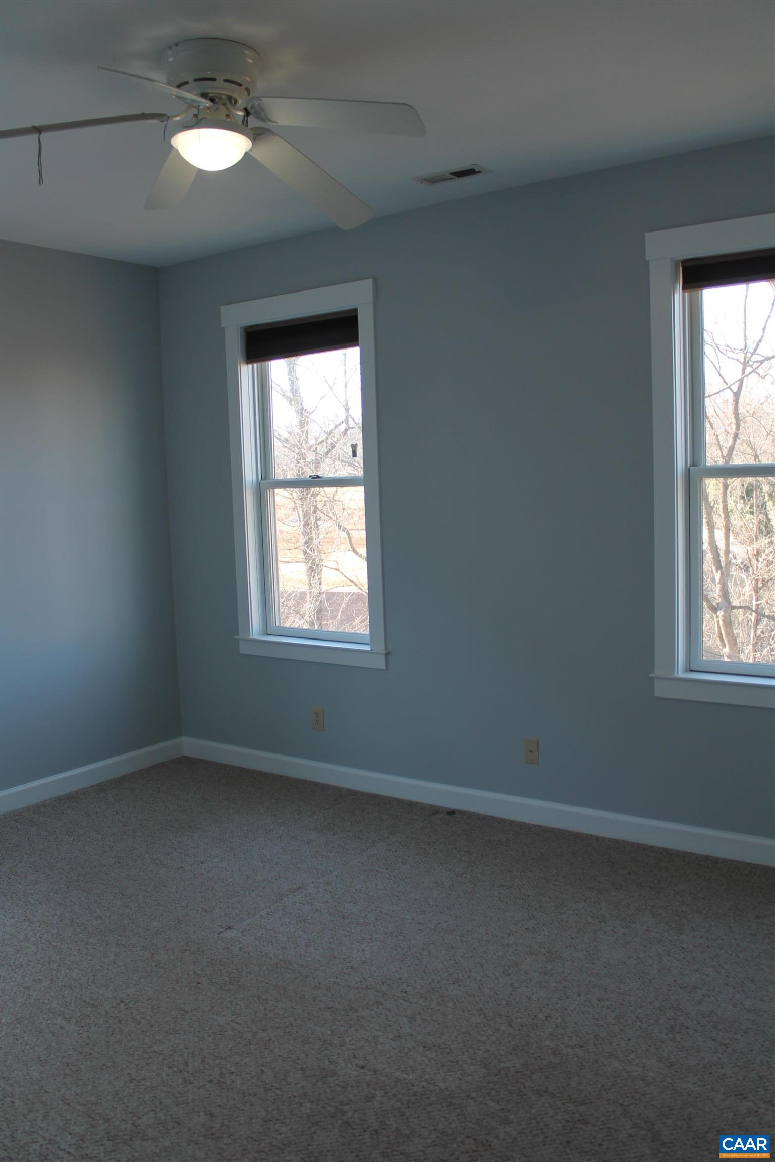 211 Spruce Street Charlottesville, VA 22902 - Photo 22 of 58 an empty room with a window