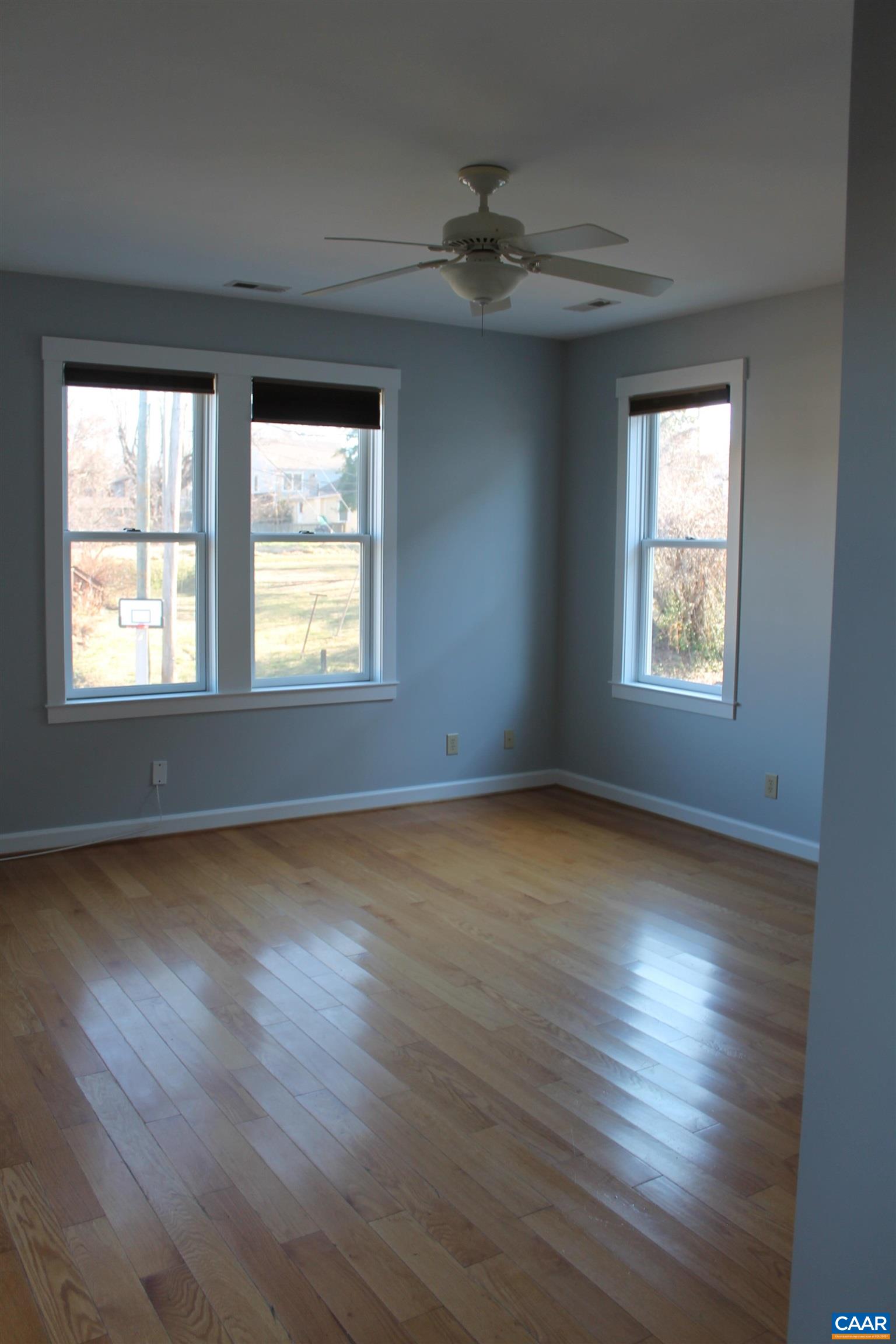 211 Spruce Street Charlottesville, VA 22902 - Photo 28 of 58 a view of an empty room window and wooden floor