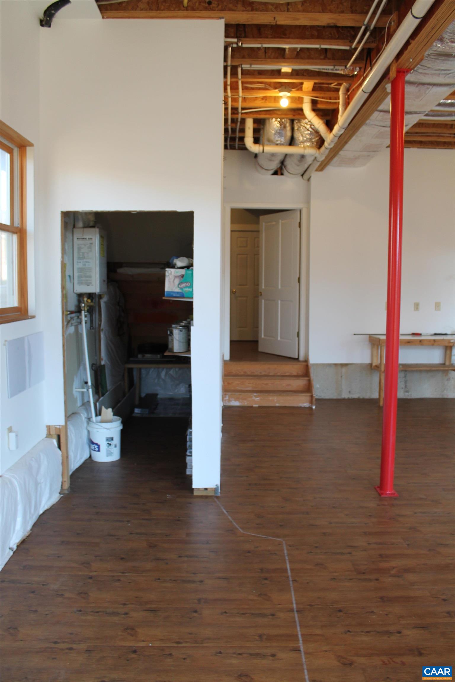 211 Spruce Street Charlottesville, VA 22902 - Photo 56 of 58 a view of empty room with wooden floor