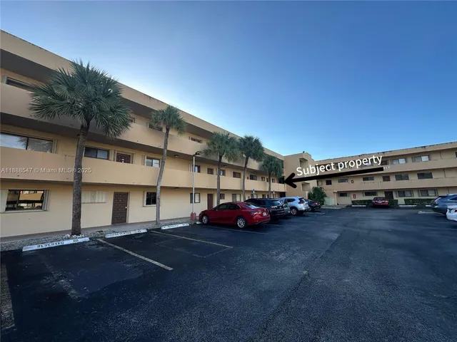 a car parked in front of a building