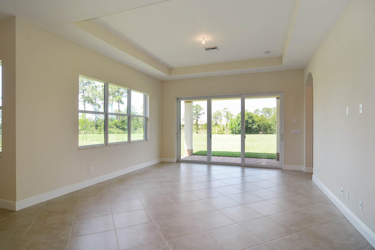 7414 Southeast Ravissant Drive Stuart, FL 34997 - Photo 4 of 25 a view of an empty room with a window