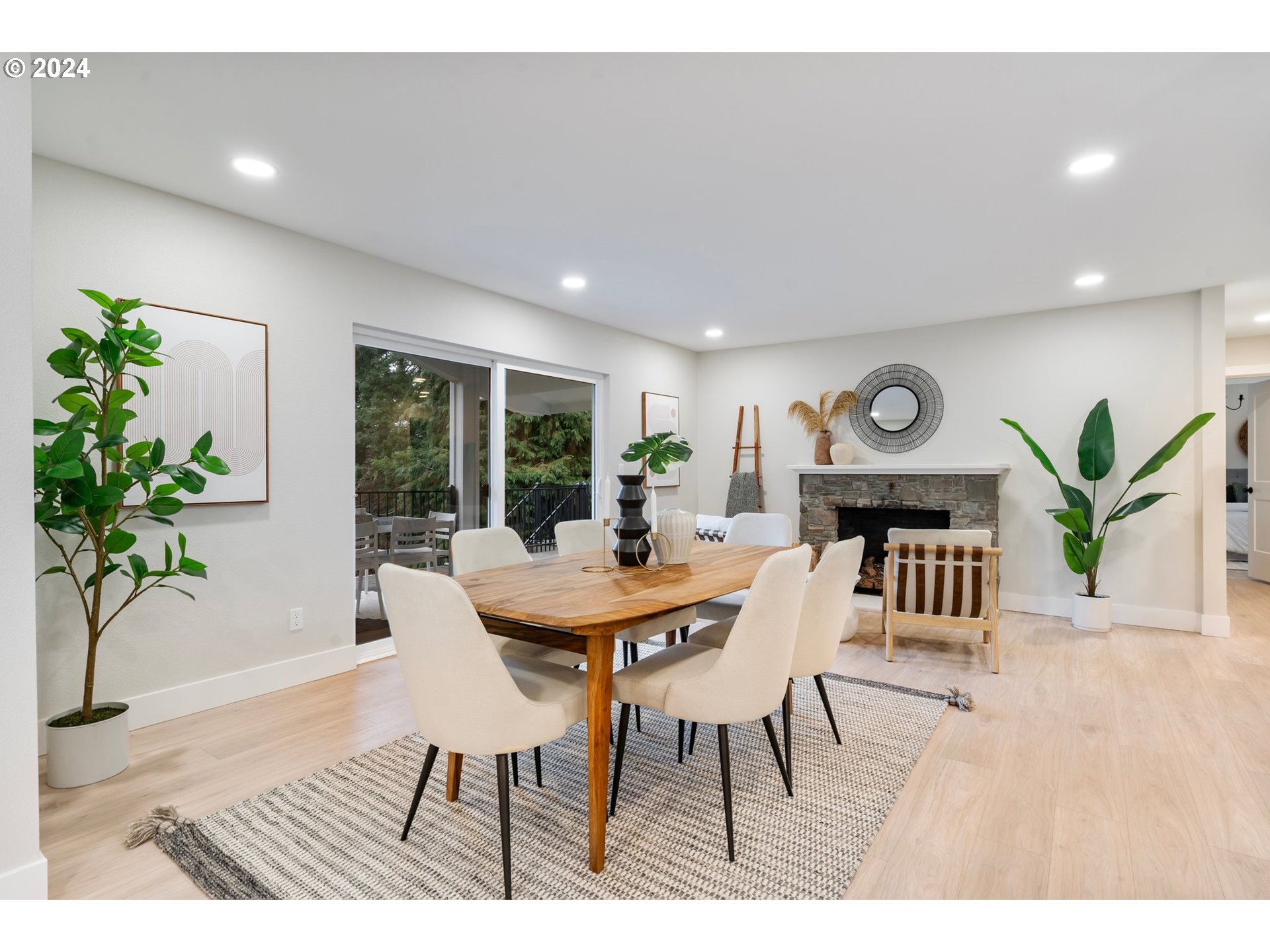 2711 Greentree Road Lake Oswego, OR 97034 - Photo 12 of 42 a view of a dining room with furniture window and wooden floor