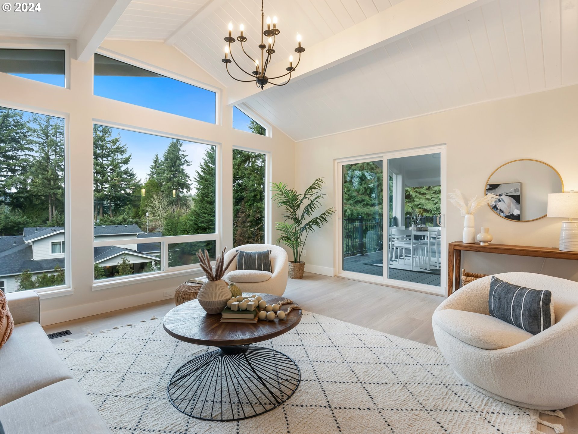 2711 Greentree Road Lake Oswego, OR 97034 - Photo 15 of 42 a living room with furniture and a large window