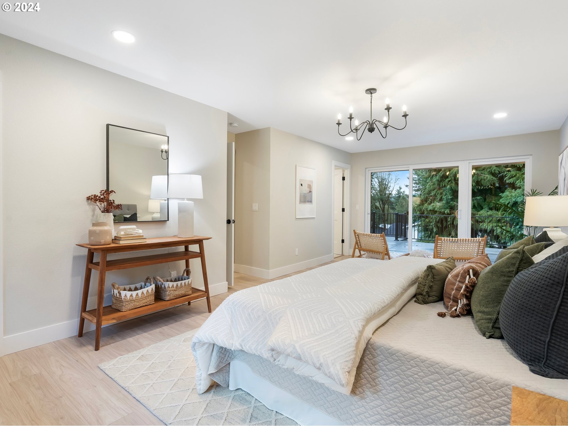 2711 Greentree Road Lake Oswego, OR 97034 - Photo 16 of 42 a bedroom with a bed and a table