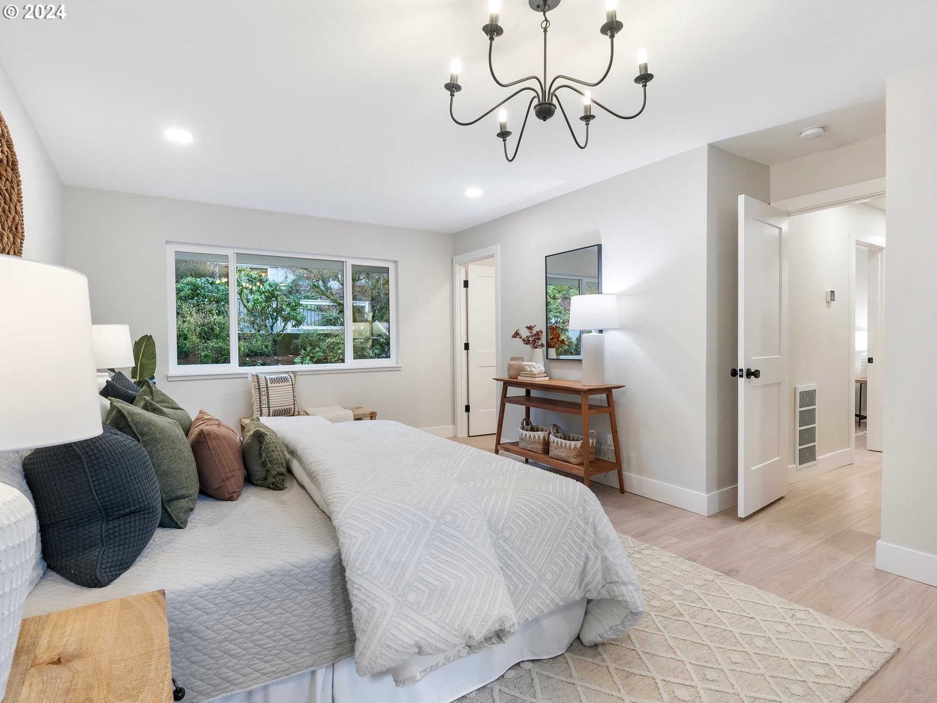 2711 Greentree Road Lake Oswego, OR 97034 - Photo 17 of 42 a bedroom with a bed ceiling fan and a window