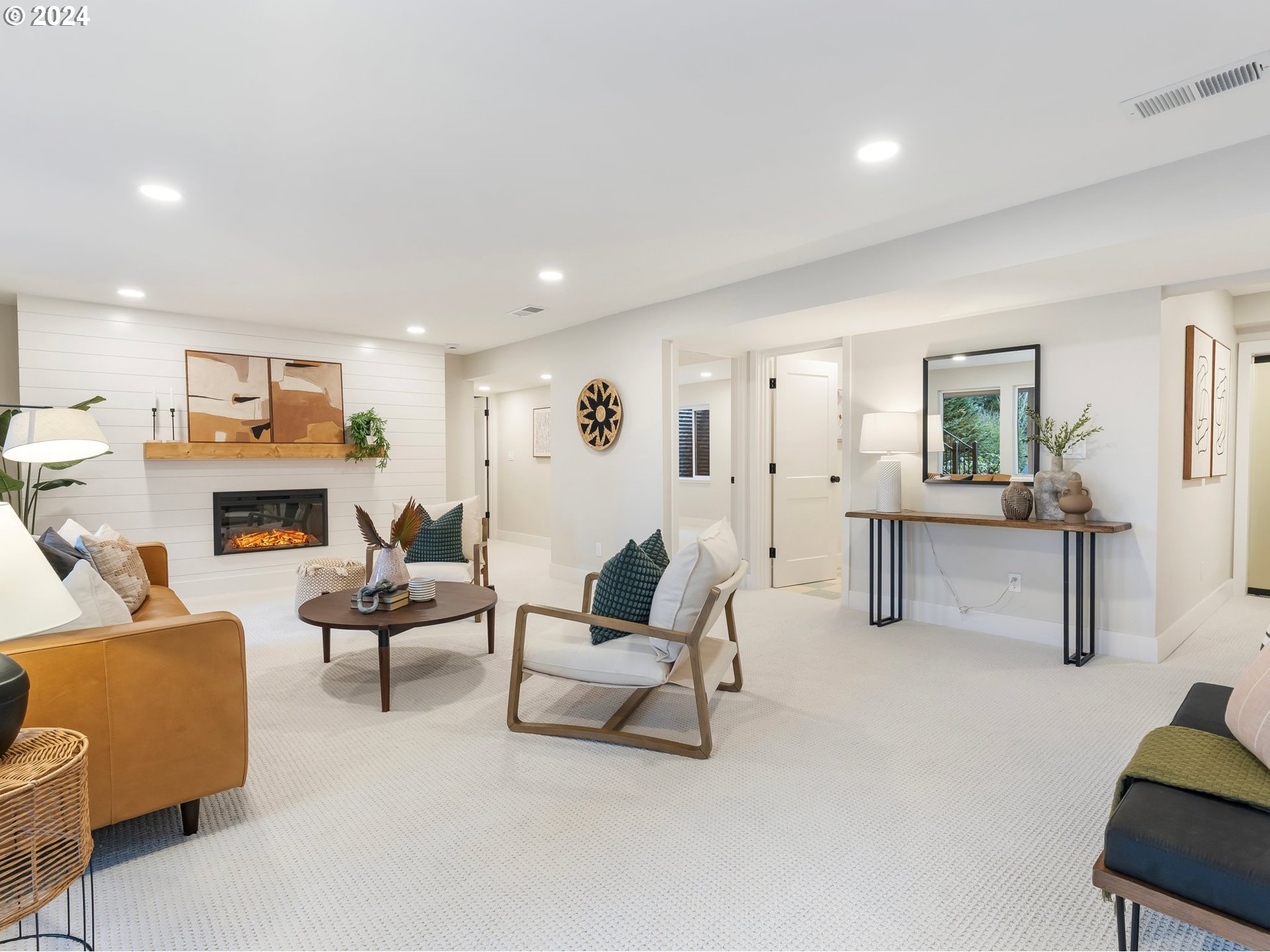 2711 Greentree Road Lake Oswego, OR 97034 - Photo 22 of 42 a living room with furniture and a fireplace