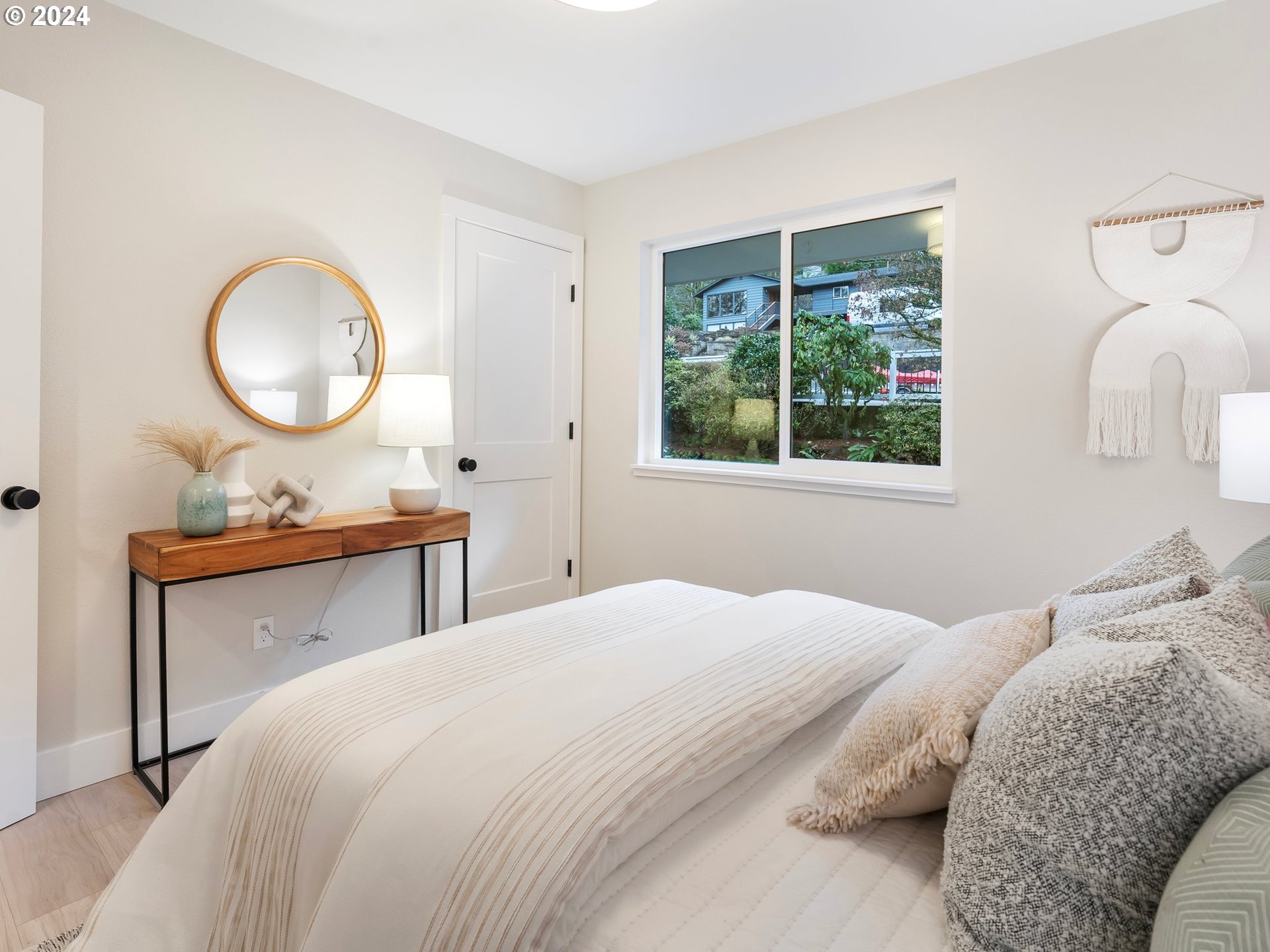 2711 Greentree Road Lake Oswego, OR 97034 - Photo 28 of 42 a bedroom with a bed and a mirror