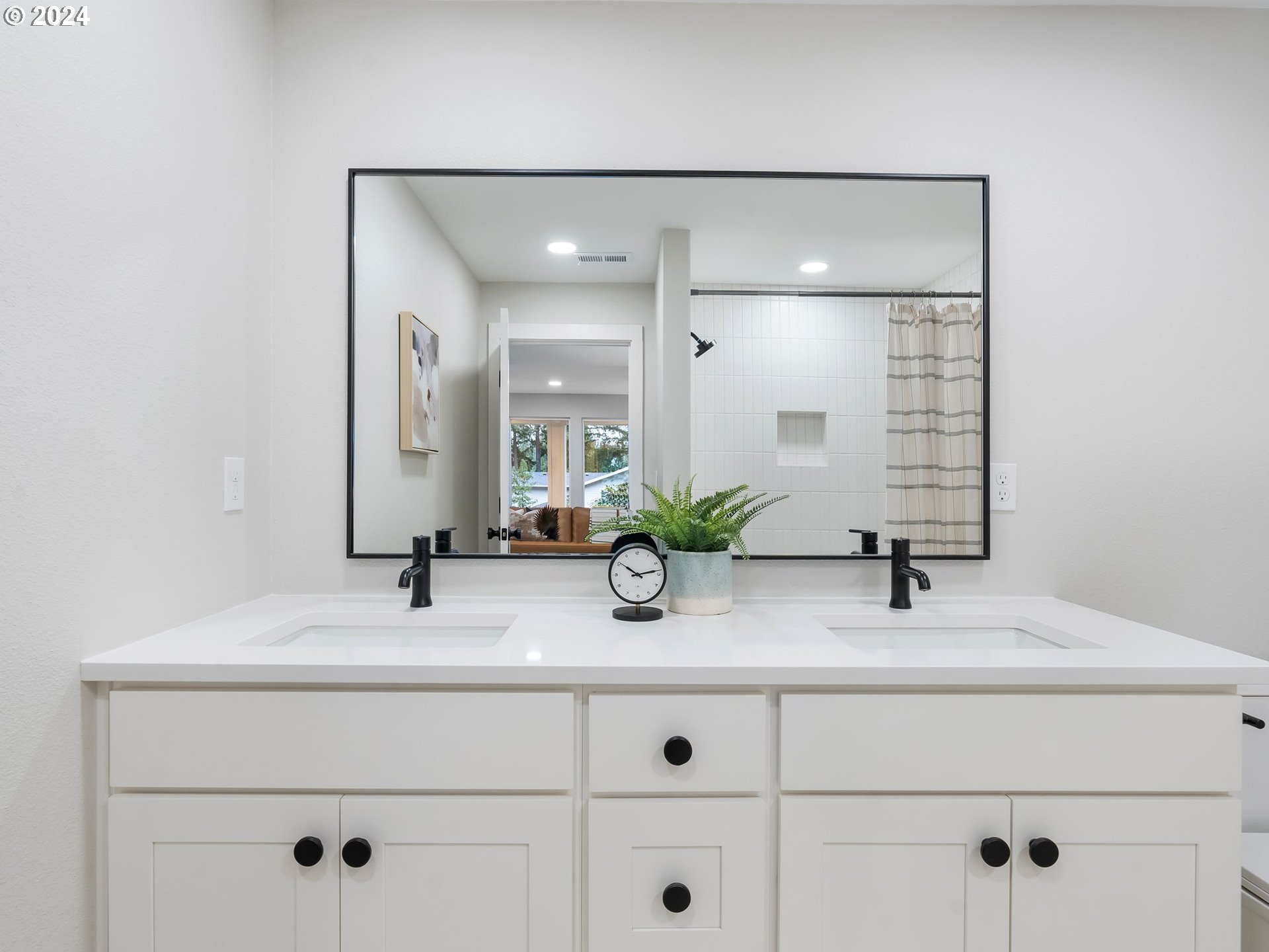 2711 Greentree Road Lake Oswego, OR 97034 - Photo 31 of 42 a bathroom with double vanity sink and two mirror