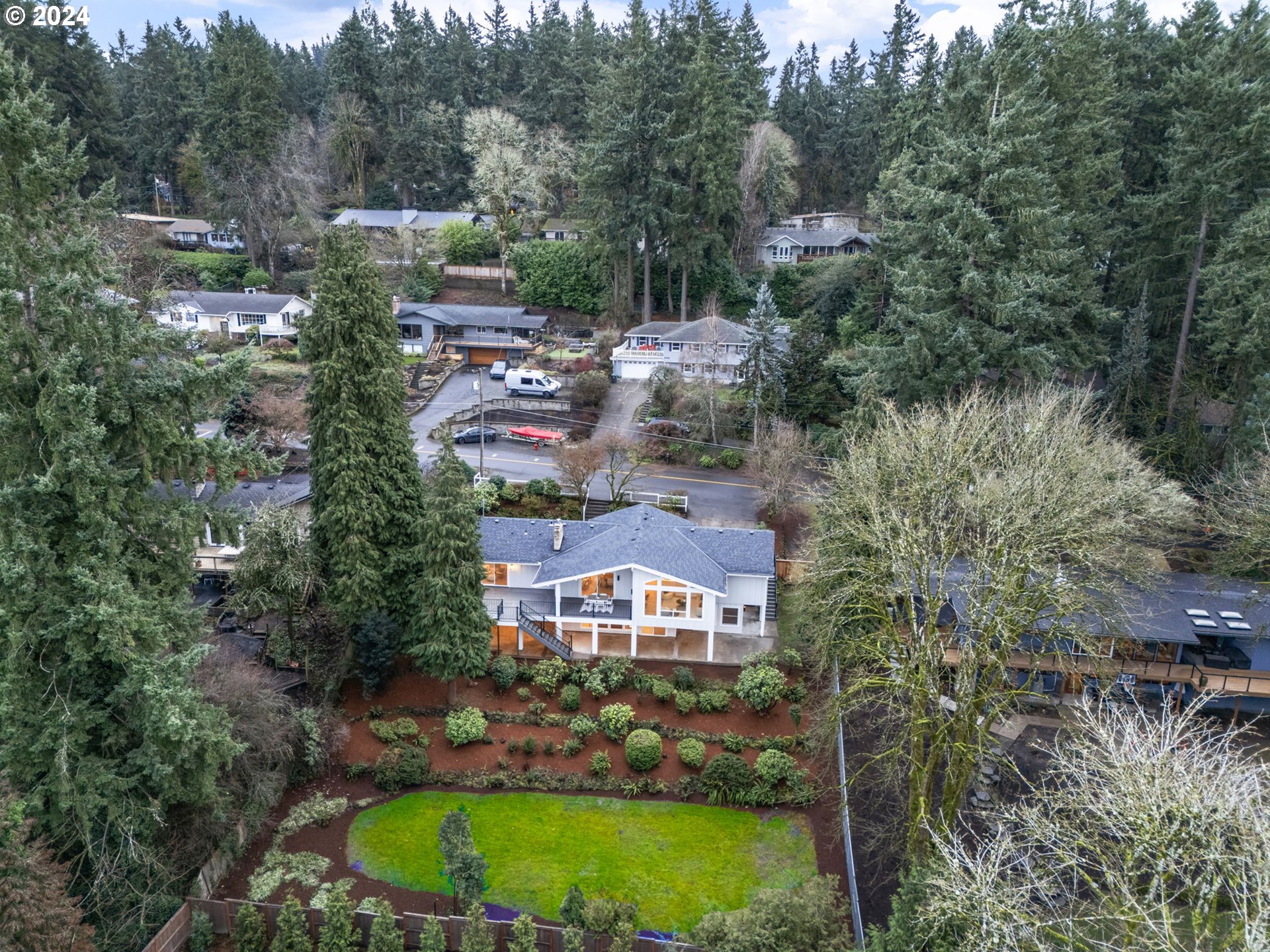 2711 Greentree Road Lake Oswego, OR 97034 - Photo 39 of 42 an aerial view of a house with a garden and trees