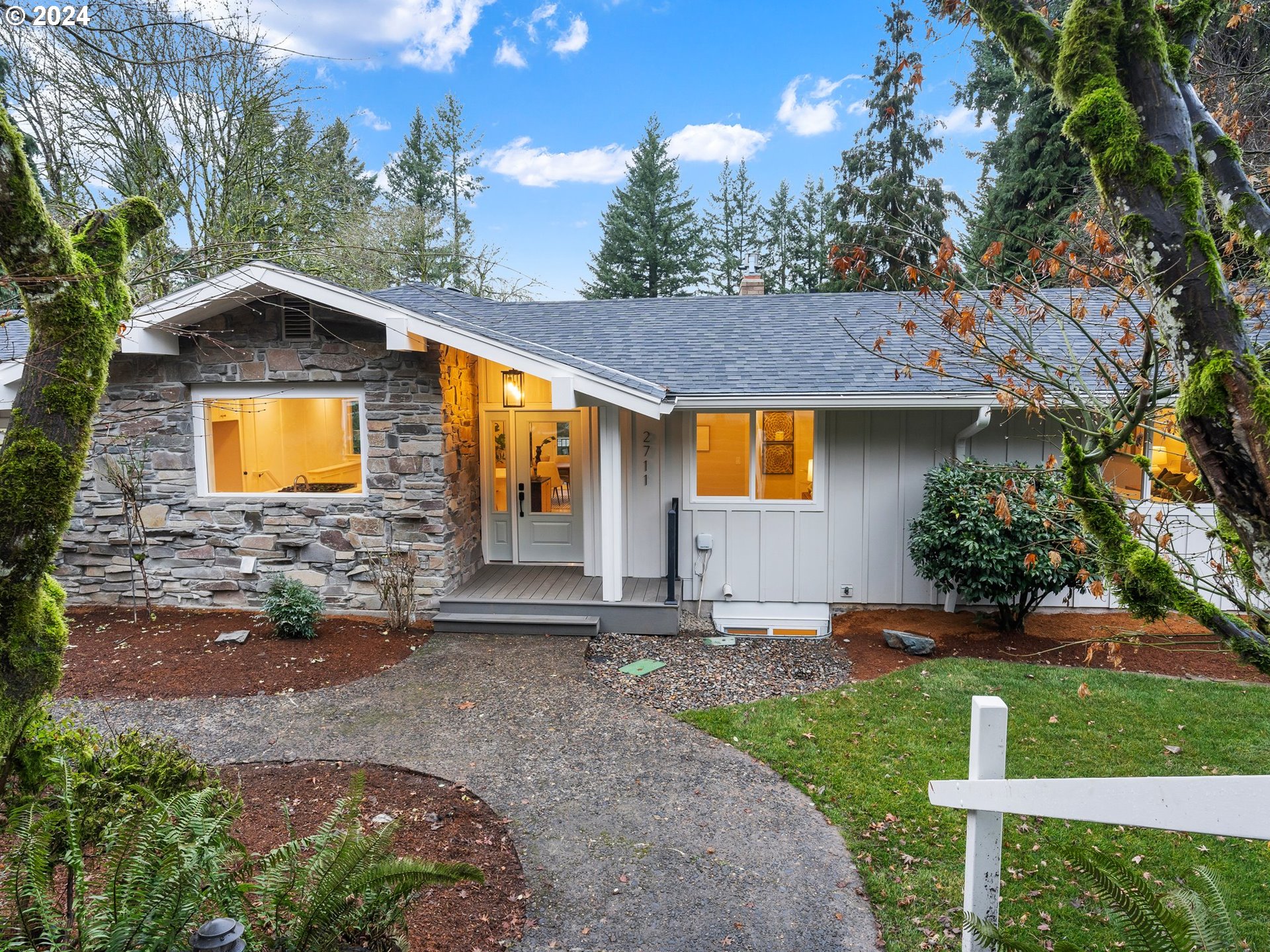 2711 Greentree Road Lake Oswego, OR 97034 - Photo 4 of 42 a backyard of a house with table and chairs