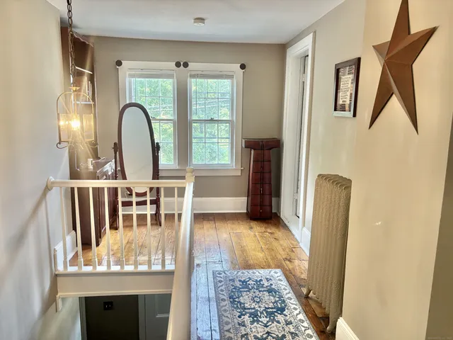 a view of entryway with a front door