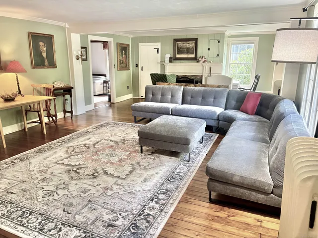 a living room with furniture and a couch