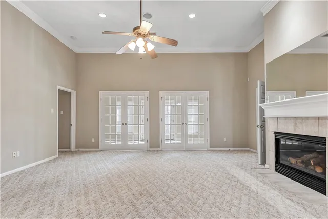 a view of an empty room with a fireplace
