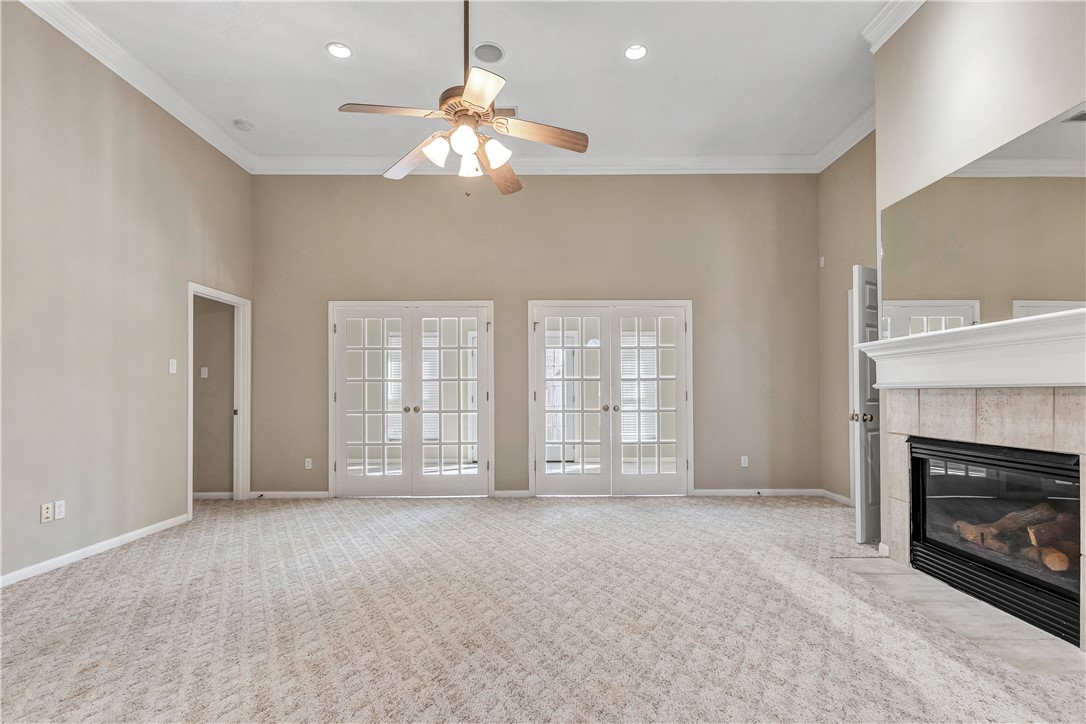 1602 Leopard Court College Station, TX 77840 - Photo 14 of 28 a view of an empty room with a fireplace