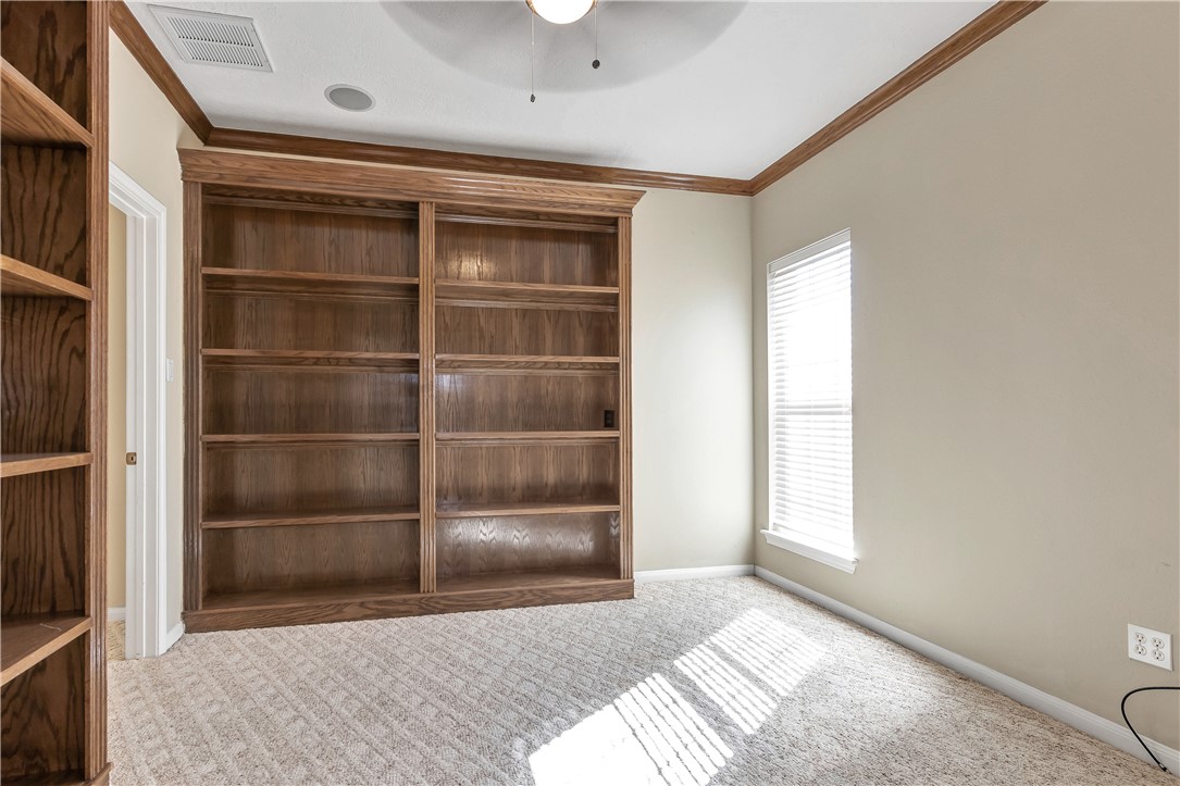 1602 Leopard Court College Station, TX 77840 - Photo 23 of 28 a bedroom with a bed and a window