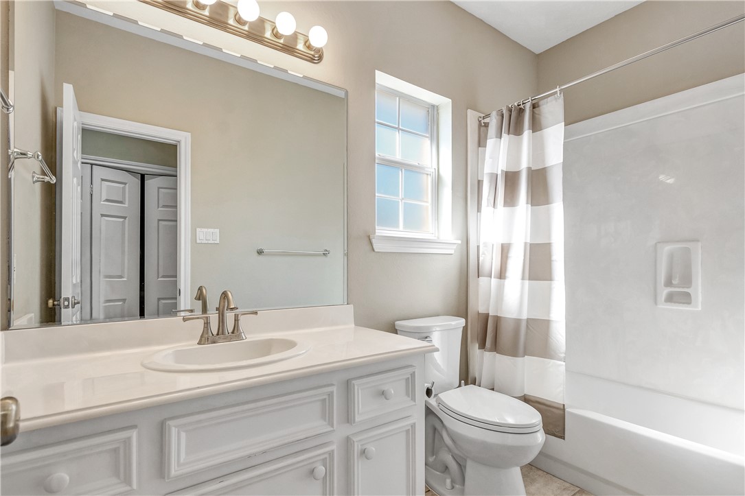 1602 Leopard Court College Station, TX 77840 - Photo 24 of 28 a bathroom with a sink toilet and shower