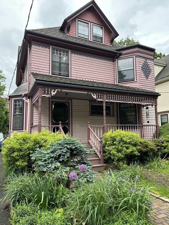 61 Toxteth Street Brookline, MA 02446 - Photo 20 of 21 front view of a house with a small yard