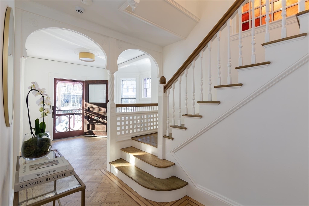 61 Toxteth Street Brookline, MA 02446 - Photo 4 of 21 a view of entryway and hall with wooden floor
