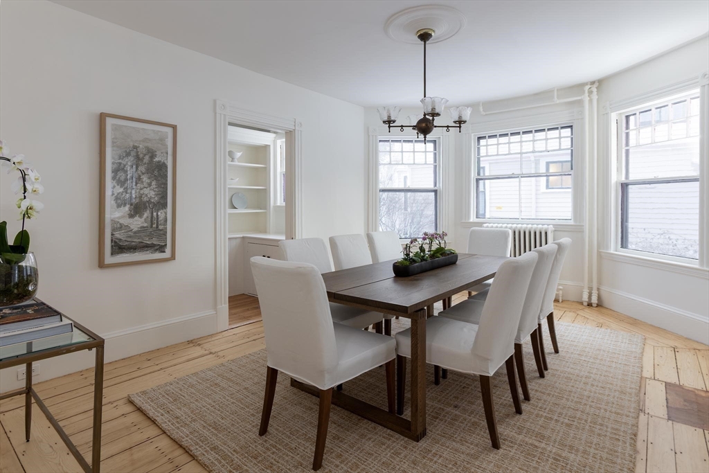 61 Toxteth Street Brookline, MA 02446 - Photo 8 of 21 a view of a dining room with furniture window and wooden floor
