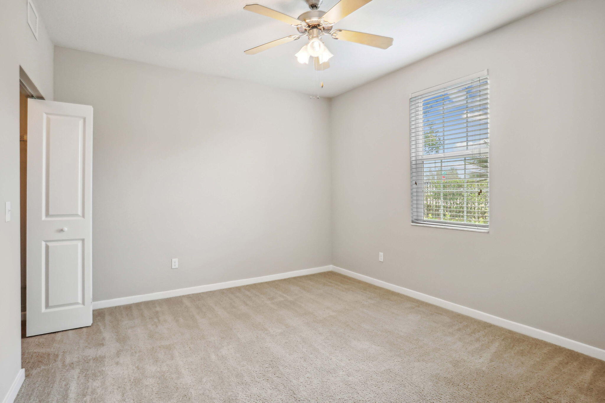 3613 High Ridge Road, Unit 304 Boynton Beach, FL 33426 - Photo 13 of 32 a view of an empty room with a window