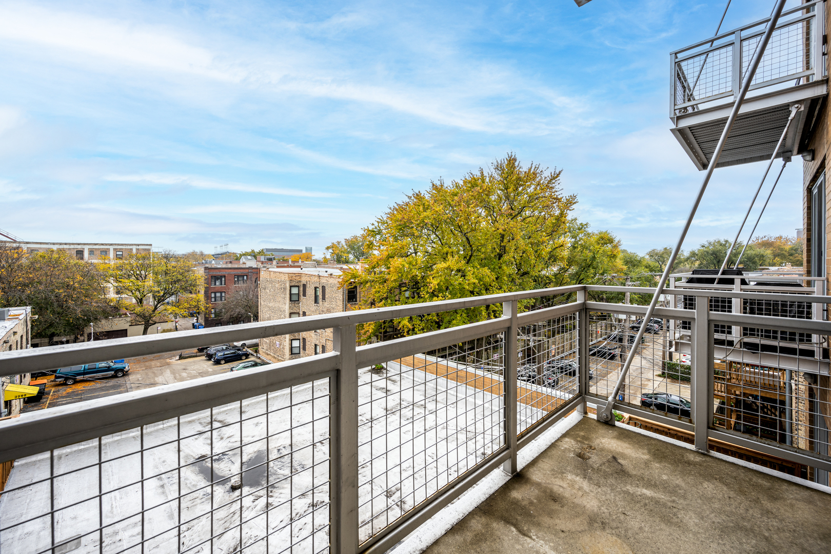 3920 North Sheridan Road, Unit 406 Chicago, IL 60613 - Photo 11 of 12 a view of balcony with furniture
