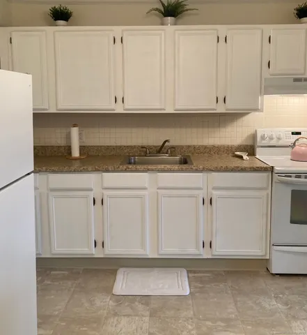 a view white cabinets and window