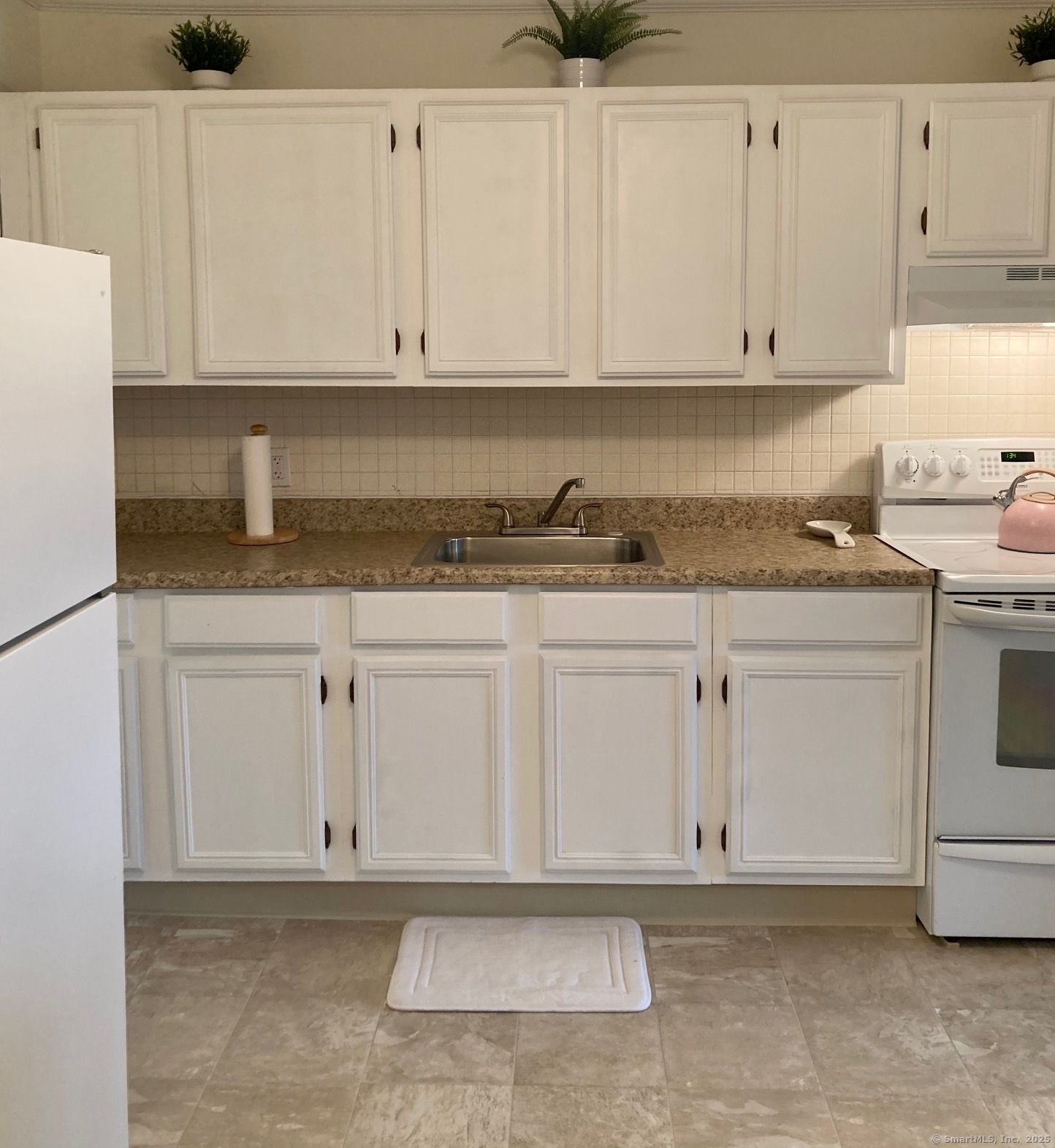 1730 State Street, Unit 302 Hamden, CT 06517 - Photo 8 of 18 a view white cabinets and window