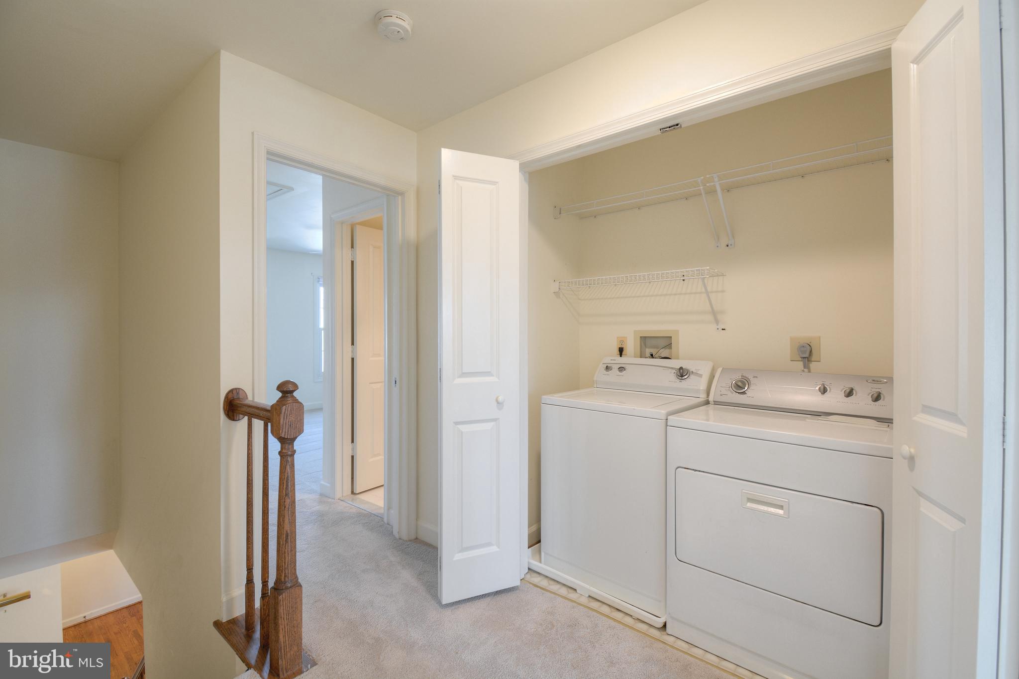 2457 Bear Den Road Frederick, MD 21701 - Photo 29 of 36 a bathroom with a sink a toilet and a mirror