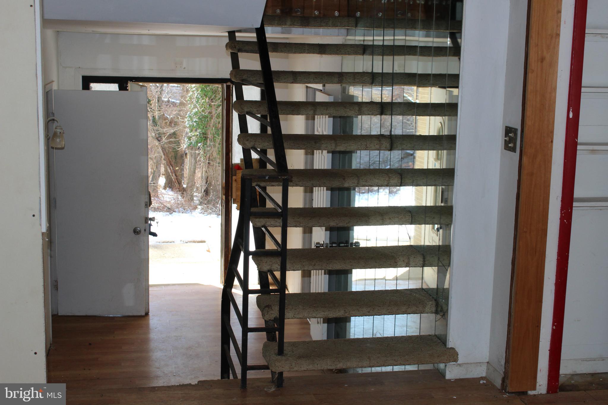 1048 Upper River Road Ewing, NJ 08628 - Photo 6 of 16 a view of a room with shelves
