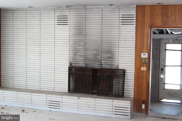 a view of a door and an empty space