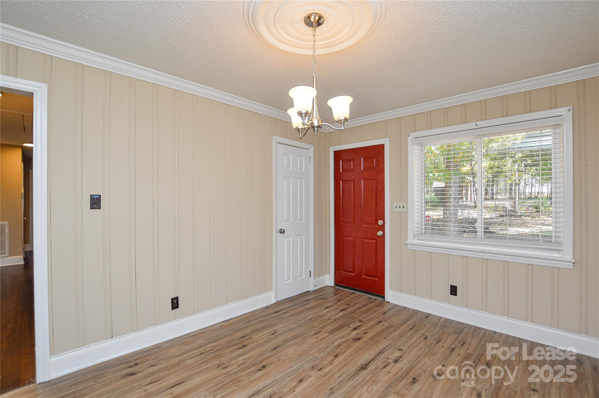 2511 Woodstar Road Matthews, NC 28105 - Photo 12 of 21 a view of an empty room with a window