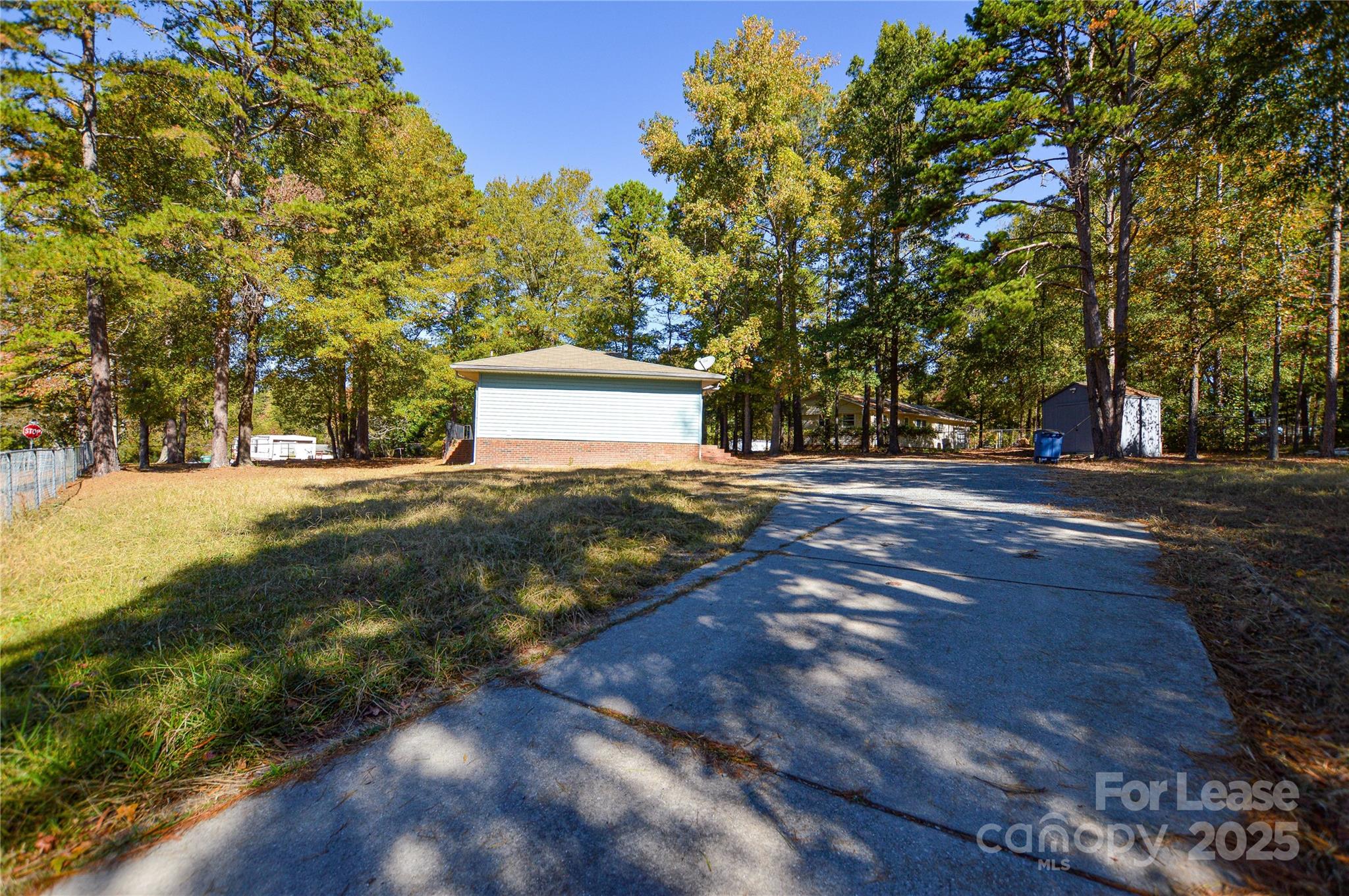 2511 Woodstar Road Matthews, NC 28105 - Photo 2 of 21 a front view of a house with a yard