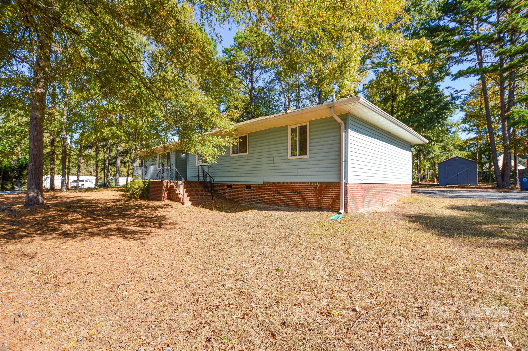 2511 Woodstar Road Matthews, NC 28105 - Photo 21 of 21 a view of road with large trees