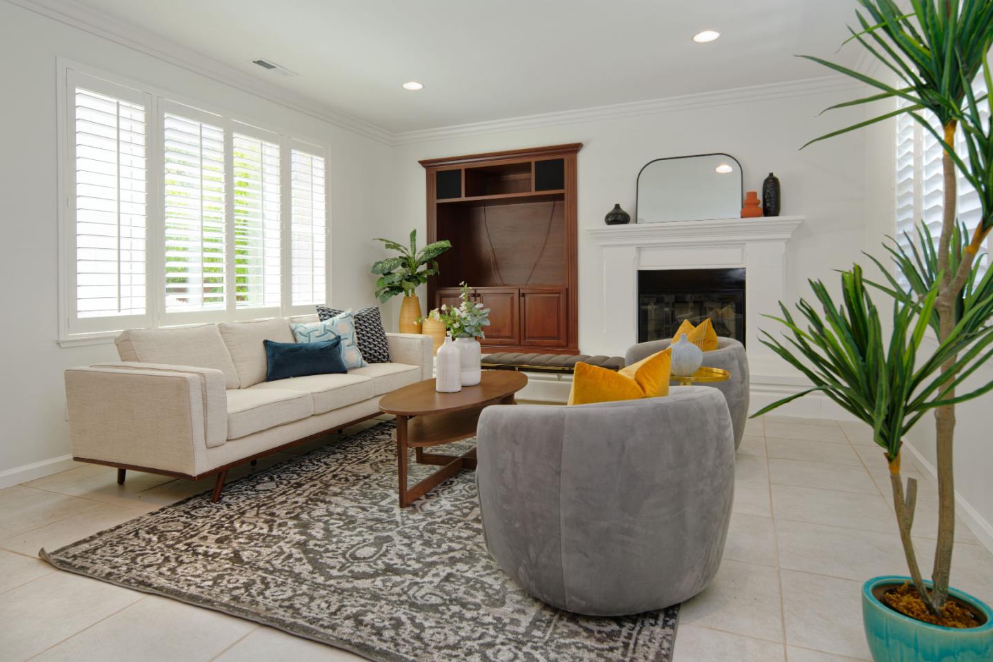 7160 Eagle Ridge Drive Gilroy, CA 95020 - Photo 12 of 80 a living room with furniture a fireplace and a potted plant