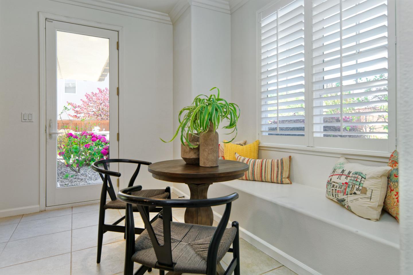 7160 Eagle Ridge Drive Gilroy, CA 95020 - Photo 17 of 80 a view of a dining room with furniture and a potted plant